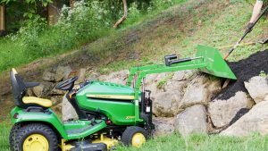 John Deere garden tractor with LGM-100 loader attachment