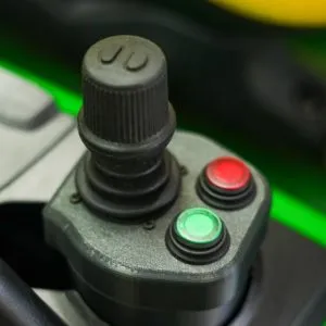Variable Speed Control joystick controller for the LGM-100 electric front-end loader with precision control buttons
