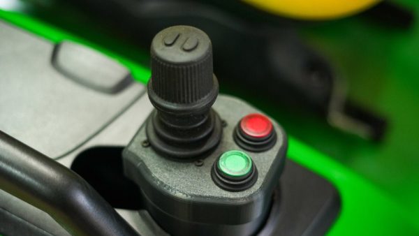 Variable Speed Control joystick controller for the LGM-100 electric front-end loader with precision control buttons