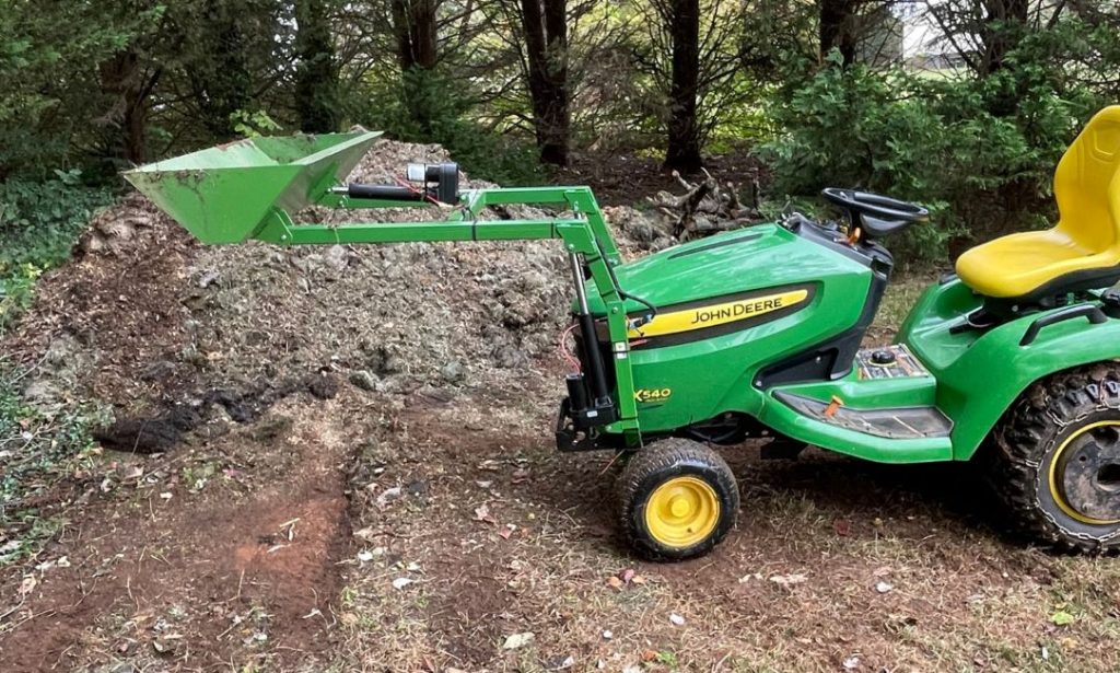 Customer photo of the installed front end loader